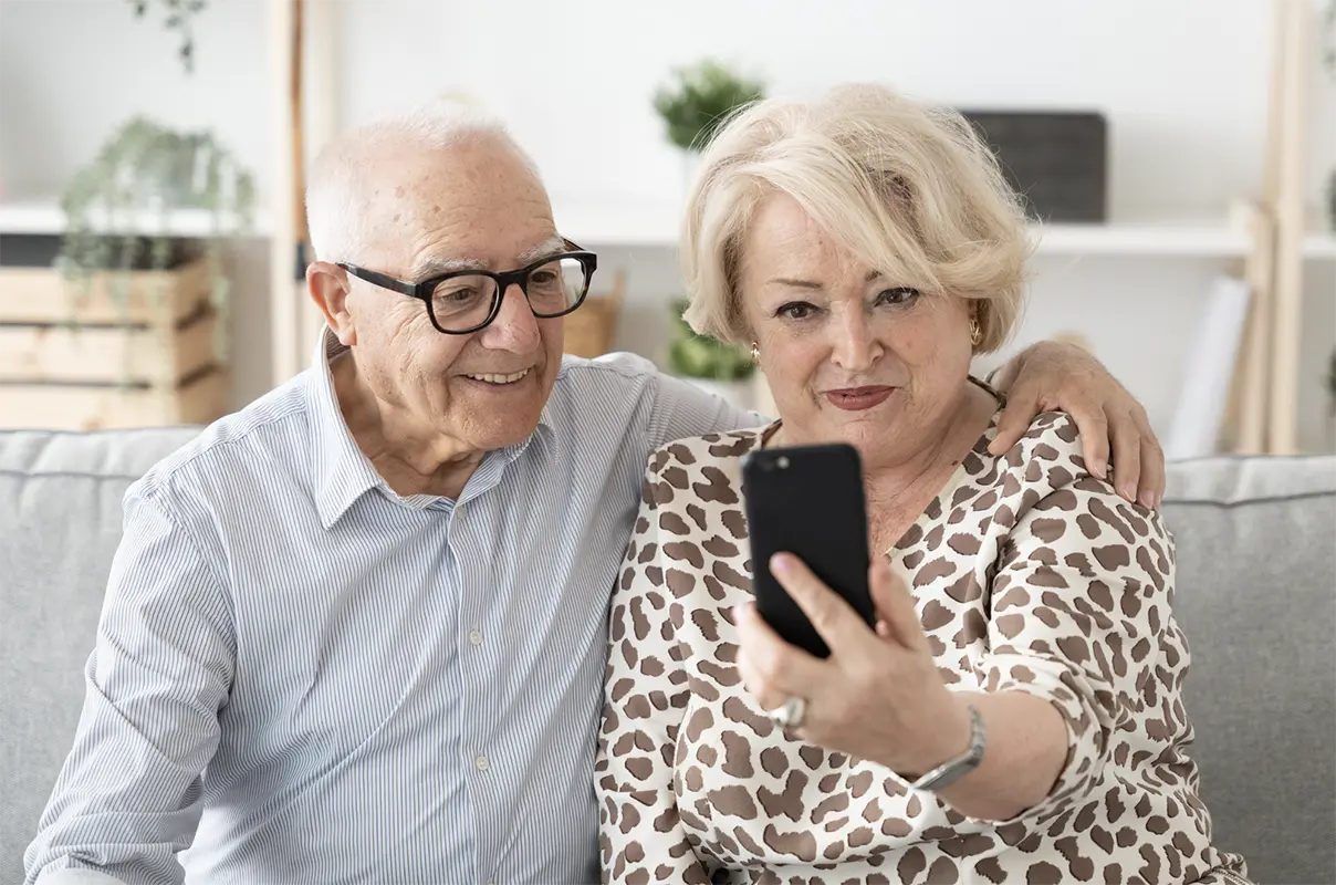 Elderly Couple on Phone