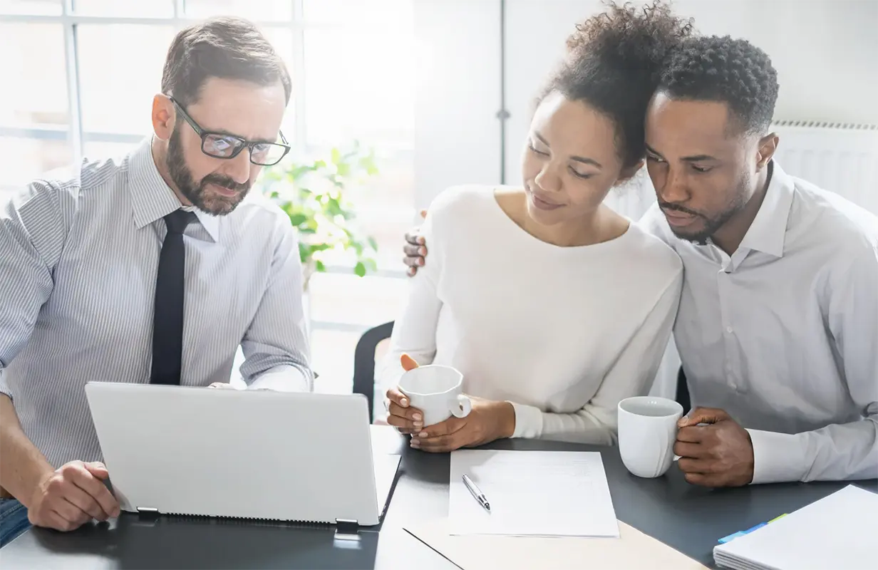 Attorney helping couple understand their trust options